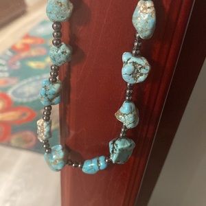Single strand necklace.  Turquoise with hematite beads.  Handmade. Beautiful